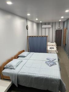 Postel nebo postele na pokoji v ubytování Hunny Home
