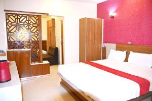 Postel nebo postele na pokoji v ubytování HOTEL PERFECT PLAZA + 23 fotografií