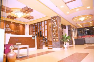 The lobby or reception area at HOTEL PERFECT PLAZA