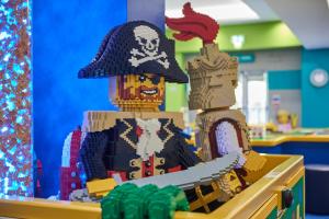 a lego figurine of a pirate with a sword at LEGOLAND(R) Windsor Resort in Windsor
