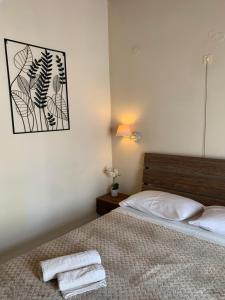 Postel nebo postele na pokoji v ubytování Guesthouse Corali