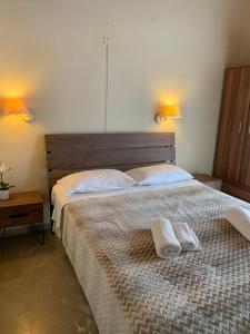 Postel nebo postele na pokoji v ubytování Guesthouse Corali
