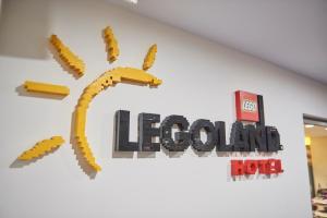 a sign for the lego show on a wall at LEGOLAND(R) Windsor Resort in Windsor