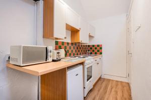 Η κουζίνα ή μικρή κουζίνα στο Cottage 5 mews Studio