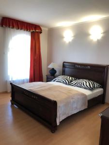 Postel nebo postele na pokoji v ubytování Willa Wicko - Międzyzdroje - apartamenty z aneksem - widok na Zalew Szczeciński