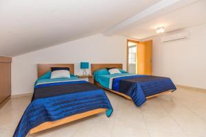 Ένα ή περισσότερα κρεβάτια σε δωμάτιο στο Apt - ROCHA 5T3 By ALGARVEMANTA +14 φωτογραφίες