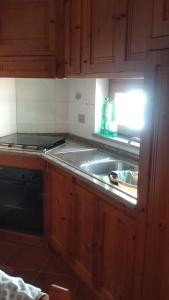 A cozinha ou cozinha compacta de Casa Rosa