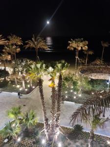 En hage utenfor Estepona, apartamento en primera linea de playa