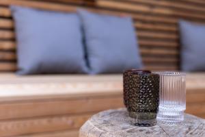 a glass cup sitting on top of a table at Chalet Ansitz Pastreinbach in Appiano sulla Strada del Vino +13 photos