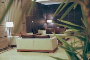 Posezení v ubytování Tskaltubo Plaza Hotel