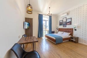 Postel nebo postele na pokoji v ubytování Scandinavian Apartments