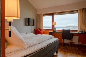 Postel nebo postele na pokoji v ubytování Thorbjørnrud Hotell