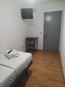 Postel nebo postele na pokoji v ubytování Hello Villarreal - Sant Joan Pensión + 7 fotografií