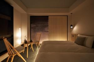 Postel nebo postele na pokoji v ubytování Hotel Resol Trinity Osaka + 37 fotografií
