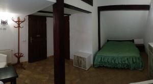 Postel nebo postele na pokoji v ubytování Green Club