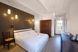 Postelja oz. postelje v sobi nastanitve Agriturismo Cascina Sciulun