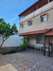 a building with a bench in front of it at בית הנשיא in Safed