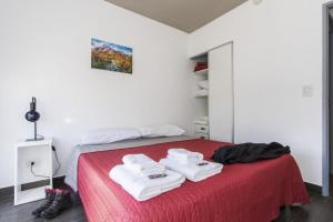 Katil atau katil-katil dalam bilik di Gente del Sur - Fuego