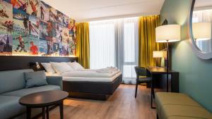Postel nebo postele na pokoji v ubytování Thon Hotel Snø