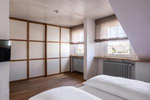 Postel nebo postele na pokoji v ubytování Villa Neugarten