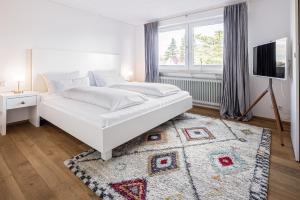 Postel nebo postele na pokoji v ubytování Villa Neugarten