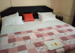 Postel nebo postele na pokoji v ubytování To Be Hotel