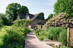 Zahrada ubytování Ferienwohnung Reethuus 5, FeWo Vermittlung Nordsee