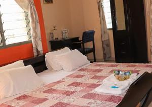 Postel nebo postele na pokoji v ubytování To Be Hotel