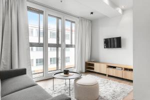 Posezení v ubytování Modern, Stylish & Comfortable Apartment