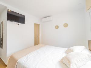 Posteľ alebo postele v izbe v ubytovaní Cubo's Hostal William's Sunny 2 with Breakfast
