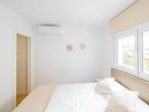 Posteľ alebo postele v izbe v ubytovaní Cubo's Hostal William's Sunny 2 with Breakfast