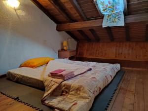 A bed or beds in a room at Il ristoro del viandante