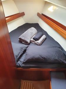 a bunk bed with two pillows on top of it at boat and breakfast in Bari