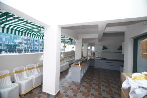 Posezení v ubytování Hotel Royal Blooms