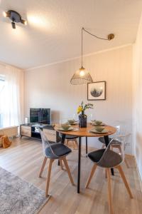 TV a/nebo společenská místnost v ubytování Apartment Bergwiese I Balkon I Aufzug I Stellplatz