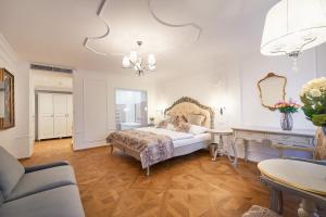 Posteľ alebo postele v izbe v ubytovaní Spa Beerland Chateaux – U Zlaté Hrušky / At Golden pear