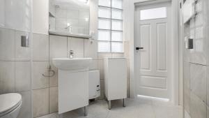 Kúpeľňa v ubytovaní Apartamenty Sun & Snow Traugutta Plaża