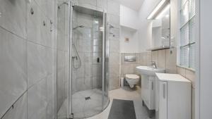 Kúpeľňa v ubytovaní Apartamenty Sun & Snow Traugutta Plaża