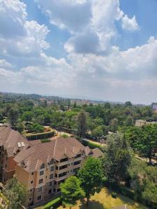 an overhead view of a apartment building with a roof at Cozy Studio Stay Kilimani Valley Acarde Area in Nairobi