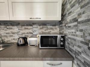 A kitchen or kitchenette at Domus Deiana