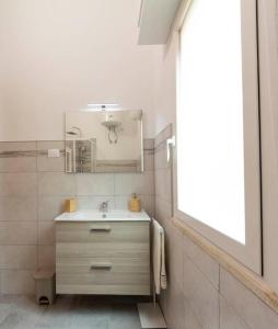 Ванная комната в Alloggio Turistico Flavia +53 фотографии