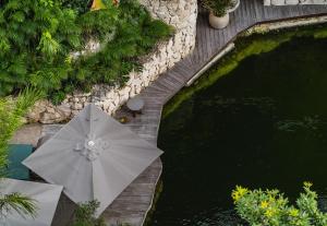 En hage utenfor Luxury 2BR Penthouse Tulum Private Pool Cenote