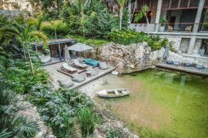 En hage utenfor Luxury 2BR Penthouse Tulum Private Pool Cenote