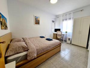 Postel nebo postele na pokoji v ubytování Cómodo apartamento en el centro de Cullera, playa 700 metros