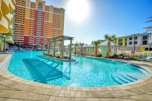 a large swimming pool in the middle of a building at Calypso 3 Luxury Beach Vacation Sleeps 8 in Panama City Beach