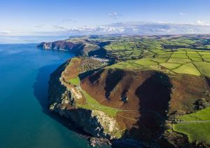 an aerial view of a large island in the water at Karrys in Lynmouth