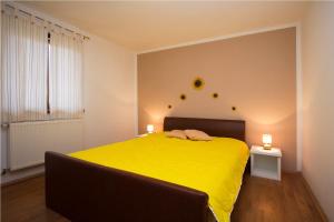 Postel nebo postele na pokoji v ubytování Apartments Matelici
