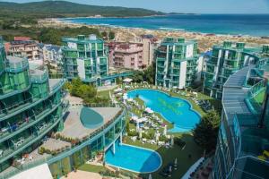 an aerial view of a resort near the beach at Двустаен апартамент в Приморско in Primorsko