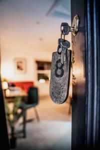 a padlock on a door in a room at Caffeine&Machine in Stratford-upon-Avon