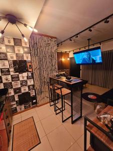 Restorāns vai citas vietas, kur ieturēt maltīti, naktsmītnē Studio Aisiki - Apartamento em Brasília